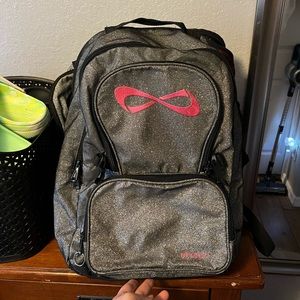 Grey w/ pink nfinity symbol, nfinity cheer bag/backpack